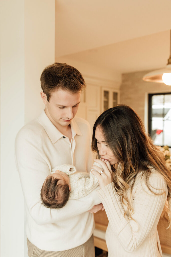 family photos in home with newborn